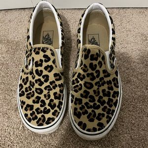 Cheetah print slip on vans.
